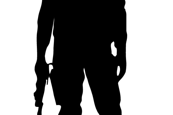 Silhouette of a Man in a Suit with a Gun