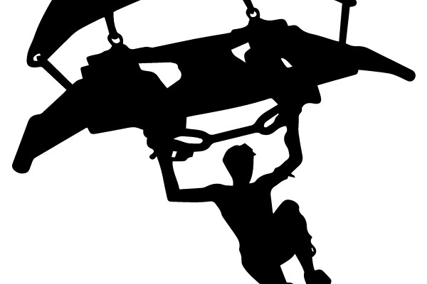 Silhouette of a Paraglider in Action