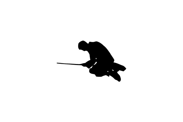 Silhouette of a Person Kayaking
